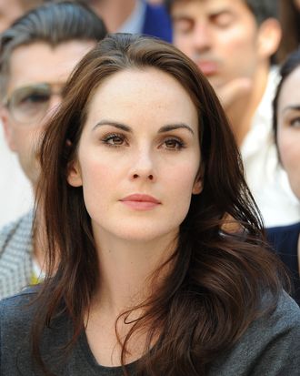 Actress Michelle Dockery attend the Burberry Prorsum show as part of Milan Fashion Week Menswear Spring/Summer 2013 on June 23, 2012 in Milan, Italy.