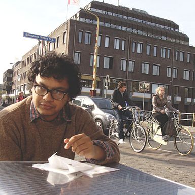 Udbhav finishing a pastry in Utrecht.