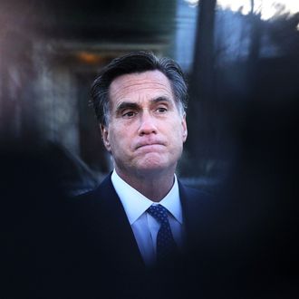 BELMONT, MA - MARCH 06: Republican presidential candidate, former Massachusetts Gov. Mitt Romney looks on during a press availability after voting at the Beech Street Senior Center on March 6, 2012 in Belmont, Massachusetts. Mitt Romney cast his ballot for the Super Tuesday primary in Massachusetts before attending his Super Tuesday gathering. (Photo by Justin Sullivan/Getty Images)