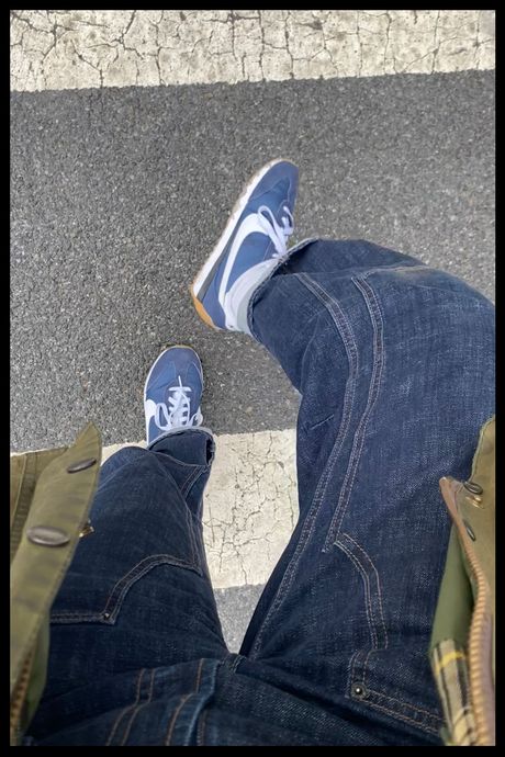 Overhead photo of Strategist senior writer Liza Corsillo wearing Nike Pacific sneakers on a Brooklyn cross walk.