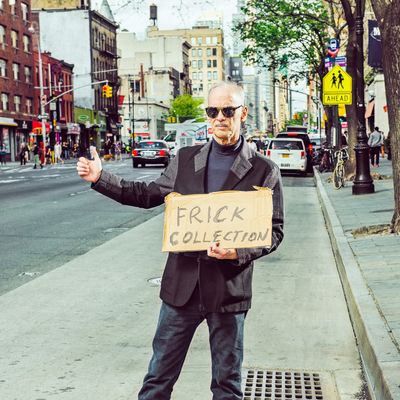 John Waters with his hitchhiking sign at 12th st and 6th ave