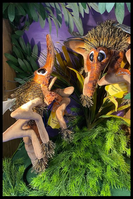 Photo of two fuzzy mosquito hand puppets at the Toy Fair in New York City.