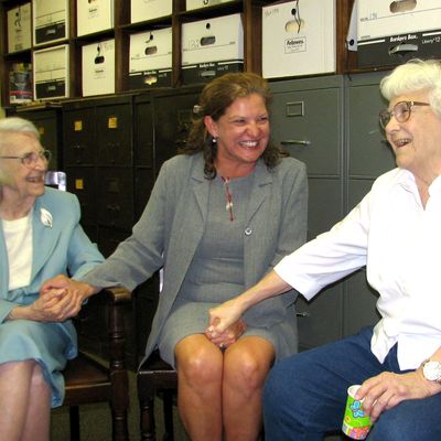 FILE - in this Sept. 11, 2006 file photo, attorney Alice Lee, left, accepts birthday wishes from Monroe County Circuit Judge-elect Dawn Hare, center, and her sister, Pulitzer-winning author Harper Lee, right, in Monroeville, Ala. Alice Lee has died, she was 103. Johnson Funeral Home in Monroeville posted an online obituary saying Lee died Monday, Nov. 17, 2014. . No cause of death was given, and the announcement says arrangements are incomplete. Lee practiced law until a few years ago, and for a time she was Alabama’s oldest practicing attorney. (AP Photo/AL.com, Connie Baggett) MAGS OUT
