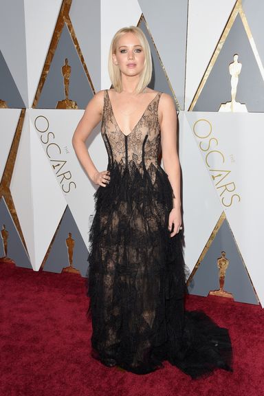 Jennifer Lawrence 
Dress by Dior Haute Couture; jewels by Chopard.