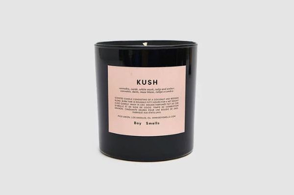 Boy Smells Scented Candle in Kush