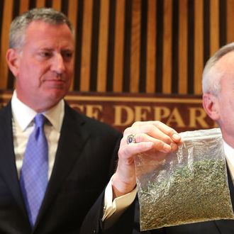 NEW YORK, NY - NOVEMBER 10: New York City Police Commissioner Bill Bratton holds up a bag of oregano to demonstrate what 25 grams of marijuana looks like at a news conference to announce changes to New York's marijuana policy on November 10, 2014 in New York City. The commissioner and New York City Mayor Bill de Blasio announced that the city will start giving out tickets (and court summons) rather than arresting people for possession of 25 grams of marijuana and under. The new guidelines for officers will result in hundreds of less arrests per year, freeing up the police to focus on other crimes. It will also free those caught with the drug from having a damaging arrest record. (Photo by Spencer Platt/Getty Images)