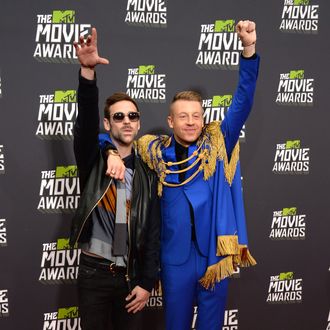 CULVER CITY, CA - APRIL 14: Musicians Macklemore (R) and Ryan Lewis arrive at the 2013 MTV Movie Awards at Sony Pictures Studios on April 14, 2013 in Culver City, California. (Photo by Jason Merritt/Getty Images)