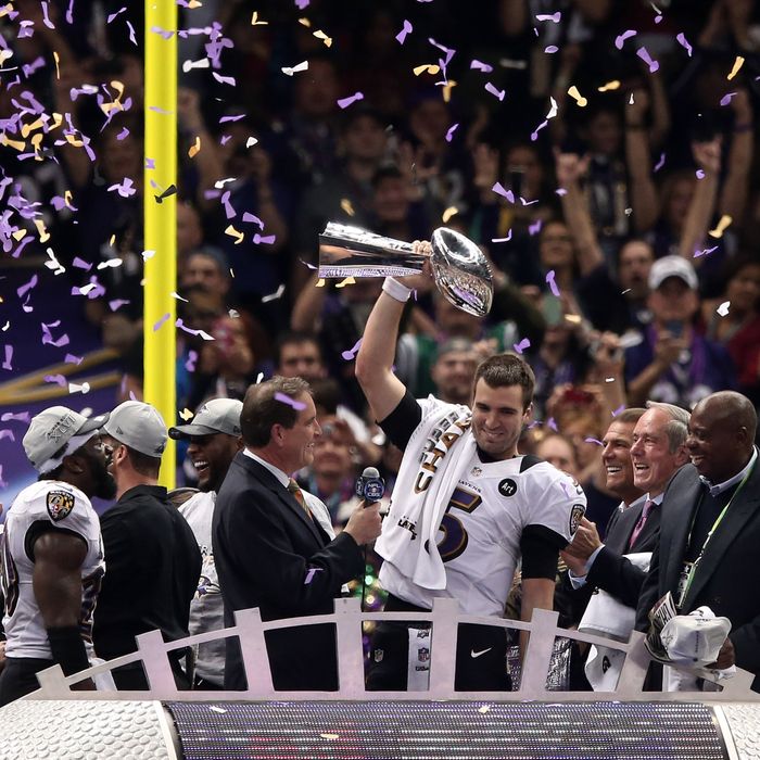 NEW ORLEANS, LA - FEBRUARY 03: Super Bowl MVP Joe Flacco #5 of the Baltimore Ravens celebrates with the Vince Lombardi trophy after the Ravens won 34-31 against the San Francisco 49ers during Super Bowl XLVII at the Mercedes-Benz Superdome on February 3, 2013 in New Orleans, Louisiana. (Photo by Win McNamee/Getty Images)