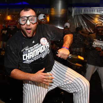 Joba Chamberlain #62 of the New York Yankees celebrates winning the American League East Division Championship after their 14-2 win against the Boston Red Sox on October 3, 2012 at Yankee Stadium.