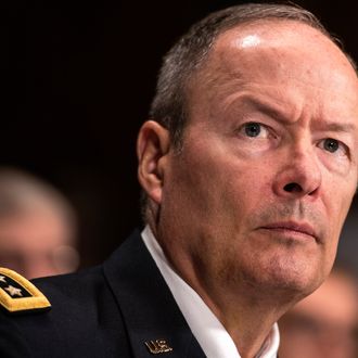 General Keith Alexander, Director of the National Security Agency, listens during a hearing of the Senate Judiciary on Capitol Hill October 2, 2013 in Washington, DC. The committee called James R. Clapper, the director of national intelligence, Alexander and others to testify about Foreign Intelligence Surveillance Act and surveillance on American citizens. 