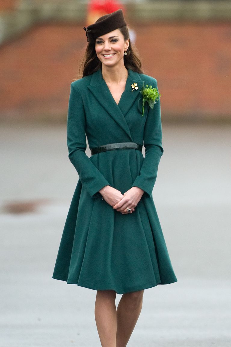 ALDERSHOT, ENGLAND - MARCH 17: Catherine, Duchess of Cambridge takes part in a St Patrick’s Day parade as she visits Aldershot Barracks on St Patrick’s Day on March 17, 2012 in Aldershot, England. The Duchess presented shamrocks to the Irish Guards at a St Patrick’s Day parade during her visit. (Photo by Samir Hussein/WireImage)