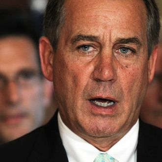 WASHINGTON - JULY 25: U.S. Speaker of the House Rep. John Boehner (R-OH) (2nd L) speaks to the media as House Majority Leader Rep. Eric Cantor (R-VA) (R) listens during a media availability July 25, 2011 on Capitol Hill in Washington, DC. Boehner and House GOP leaders discussed the latest development of the debt ceiling negotiation. (Photo by Alex Wong/Getty Images)