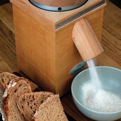 A beechwood countertop grain mill, made by KoMo.