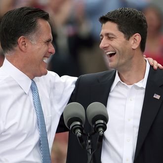 NORFOLK, VA - AUGUST 11: Republican presidential candidate, former Massachusetts Gov. Mitt Romney (L) jokes with Rep. Paul Ryan (R-WI) (R) after announcing him as the 
