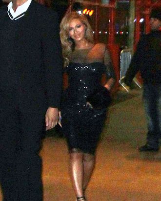 A not-so-good photo of Beyonce looking fabulous, and apparently walking behind a sailor.