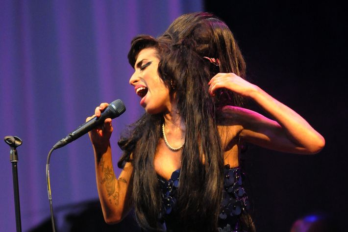 GLASTONBURY, UNITED KINGDOM - JUNE 28:  Amy Winehouse performs on the Pyramid stage during day two of the Glastonbury Festival at Worthy Farm, Pilton on June 28, 2008 in Glastonbury, Somerset, England.  (Photo by Jim Dyson/Getty Images)