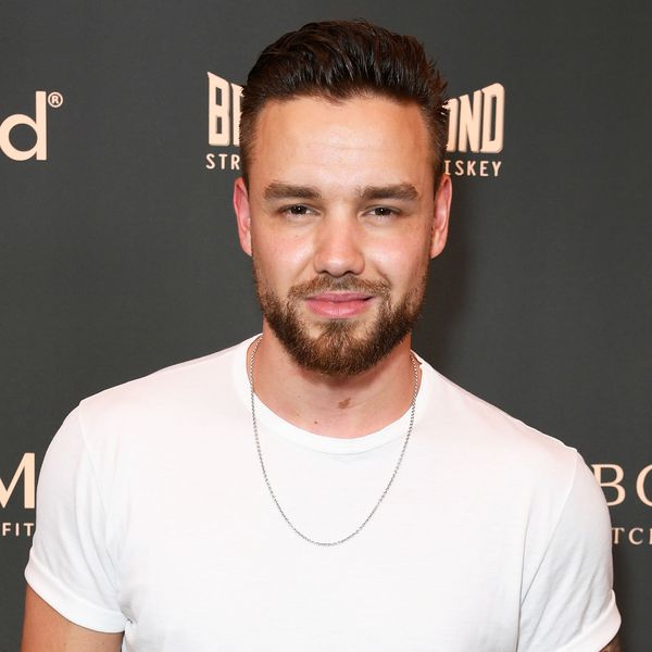 One Direction's Louis Tomlinson Rips Off Liam Payne's Shirt in Concert:  Watch – Billboard