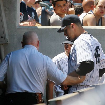 NEW YORK, NY - JUNE 27: Andy Pettitte #46 of the New York Yankees is helped to the locker room after he was hit with a batted ball in the fifth inning against the Cleveland Indians at Yankee Stadium on June 27, 2012 in the Bronx borough of New York City. (Photo by Jim McIsaac/Getty Images)