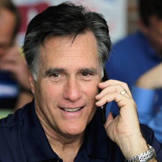 TAMPA, FL - JANUARY 31: Republican presidential candidate and former Massachusetts Gov. Mitt Romney works the phones for votes at his campaign headquarters on January 31, 2012 in Tampa, Florida. Romney has a double-digit lead going into the Florida primary today. (Photo by Joe Raedle/Getty Images)