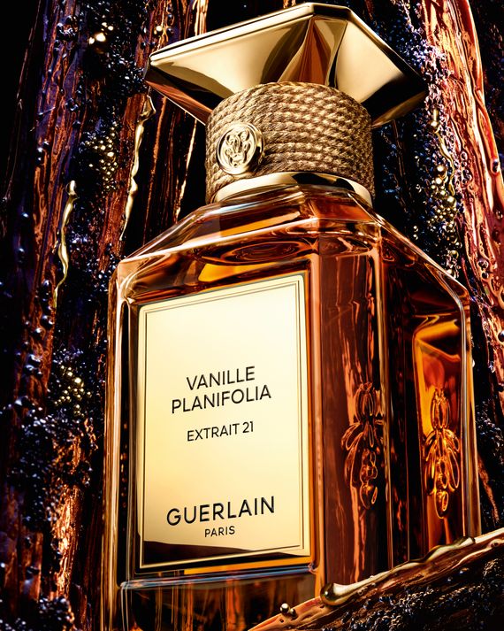 A gold bottle of perfume from Guerlain.