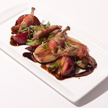 Crispy quail wrapped with bacon, red plums, spring onions, mushrooms & Rioja balsámico