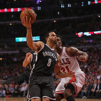 CHICAGO, IL - MAY 02: Deron Williams #8 of the Brooklyn Nets drives past Jimmy Butler #21 of the Chicago Bulls in Game Six of the Eastern Conference Quarterfinals during the 2013 NBA Playoffs at the United Center on May 2, 2013 in Chicago, Illinois. NOTE TO USER: User expressly acknowledges and agrees that, by downloading and or using this photograph, User is consenting to the terms and conditions of the Getty Images License Agreement. (Photo by Jonathan Daniel/Getty Images)