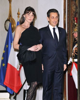 Bruni at a function with her husband, French president Nicolas Sarkozy, on March 2.