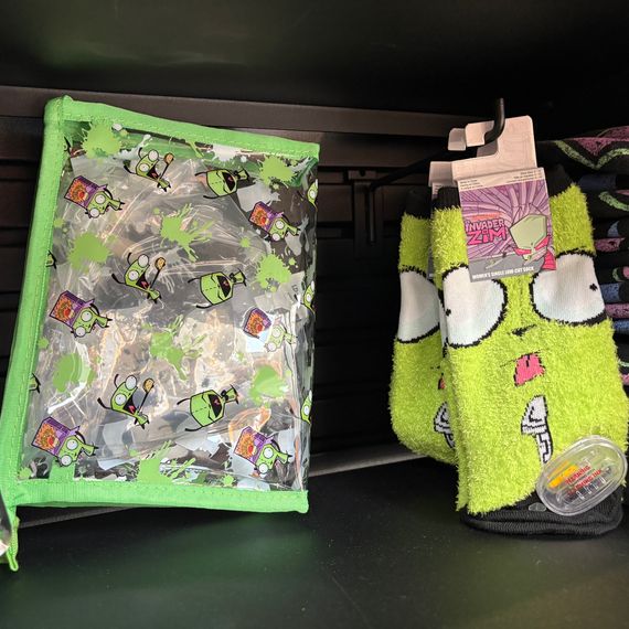 GIR-themed makeup bag and fuzzy socks. 