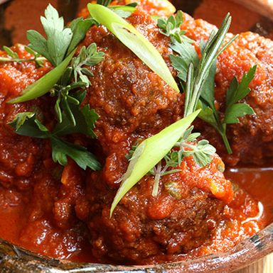 Oxtail meatballs in tomato sauce.