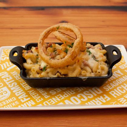 Tickler Cheddar, Gruyere and Mozzarella di Bufala, Tasso Ham, and Onion Rings.