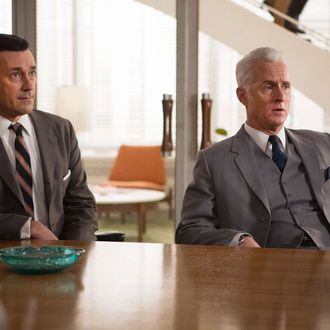 Jon Hamm as Don Draper and John Slattery as Roger Sterling - Mad Men _ Season 7, Episode 6- Photo Credit: Justina Mintz/AMC