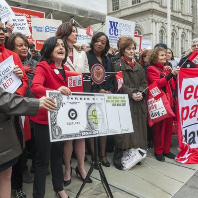 PowHer NY speaks on the steps of City Hall in New York at a rally against pay disparity on Equal Pay Day last month. 