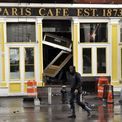The Paris Cafe, seen here immediately after the storm, reopened on October 17.