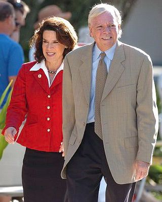 05 Sep 2006, Florida, USA --- FILE - In this Sept. 5, 2006, file photo, Katherine Harris, left, and her husband, Anders Ebbeson, arrive at their polling precinct to vote in the primary elections in Longboat Key, Fla. Police say Ebbeson was found dead of an apparent suicide at the couple's home in Sarasota, Fla., Tuesday Nov. 19, 2013. (AP Photo/Steve Nesius, File) --- Image by ? Steve Nesius/AP/Corbis