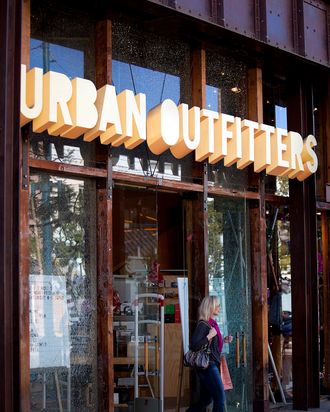 A customer walks out of an Urban Outfitters Inc. store at the Third Street Promenade outdoor mall in Santa Monica, California, U.S, on Monday, Dec. 5, 2011.