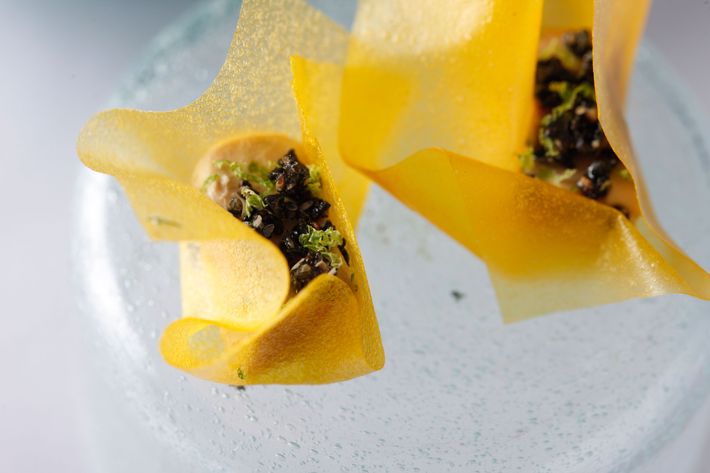 Foie gras terrine with mango leather and black sesame.