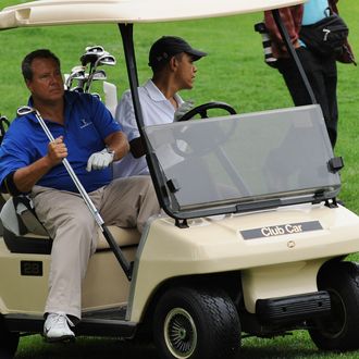 US President Barack Obama drives a golf cart with Robert Wolf sitting next to him as he plays golf at Mink Meadows Golf Club in Vineyard Haven on Martha's Vineyard, Massachusetts, on August 25, 2010. The US First Family is vacationing on the Island till August 29. AFP PHOTO/Jewel Samad (Photo credit should read JEWEL SAMAD/AFP/Getty Images)