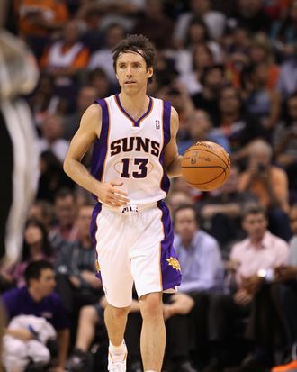 Steve Nash #13 of the Phoenix Suns moves the ball upcourt during the NBA game against the San Antonio Spurs at US Airways Center on April 25, 2012 in Phoenix, Arizona. The Spurs defeated the Suns 110-106. 