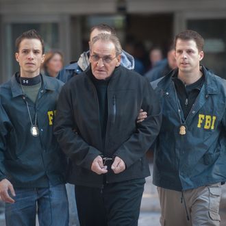 Jan. 23, 2014 - Manhattan, New York, U.S. - VINCENT ASARO, an alleged captain in the Bonanno crime family, is led from Federal Plaza as he is charged in connection with the 1978 Lufthansa heist at JFK International Airport; he was arrested for murder, racketeering, extortion, arson, robbery and other charges, Thursday, January 23, 2014. Asaro is one of five alleged members of the crime family arrested Thursday morning in the New York area by FBI agents. 