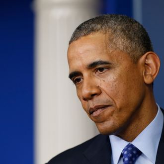 WASHINGTON, DC - JUNE 19: U.S. President Barack Obama listens to a question during a briefing about Iraq in the Brady Briefing room of the White House on June 19, 2014 in Washington, DC. Obama spoke about the deteriorating situation as Islamic State in Iraq and Syria (ISIS) militants move toward Baghdad after taking control over northern Iraqi cities. (Photo by Win McNamee/Getty Images)