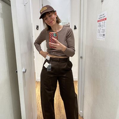 Strategist senior writers Michael Zhao and Liza Corsillo take selfies wearing Uniqlo C collection unisex 100-percent cotton unisex barrel pants.