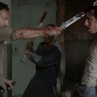 Nobody pushes Rick Grimes into a walker, especially not some little-seen human character in a wife-beater (the new redshirt?).