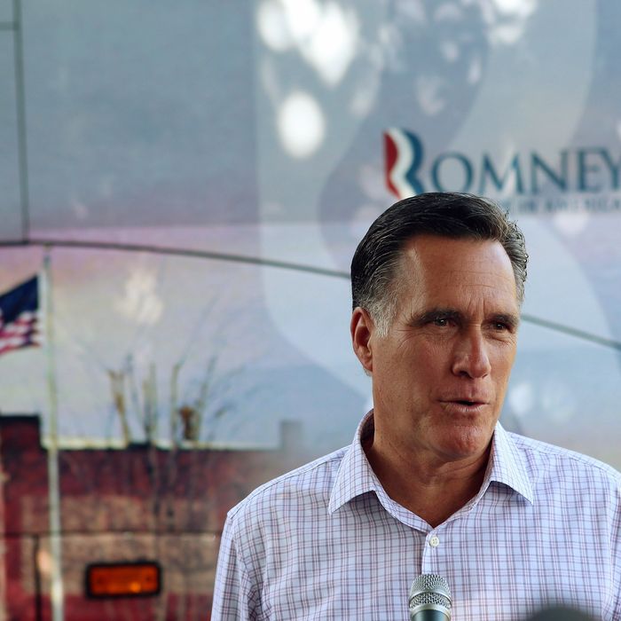 Republican Presidential candidate, former Massachusetts Governor Mitt Romney speaks to the media about President Barack Obama's announcement today of a change in the immigration policy that will allow illegal immigrants brought into the country as children to remain in the United States and apply for work permits as he campaigns during an event at the Milford Ice Cream Social on June 15, 2012 in Milford, New Hampshire.