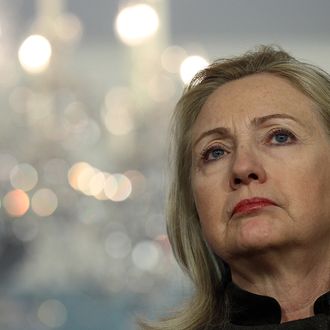 WASHINGTON, DC - FEBRUARY 13: U.S. Secretary of State HIllary Clinton listens to a question during a press conference with Turkish Foreign Minister Ahmet Davutoglu at the U.S. State Department February 13, 2012 in Washington, DC. Clinton and Davutoglu have been meeting in Washington on regional issues including Syria and Iran over the past several days. (Photo by Win McNamee/Getty Images)