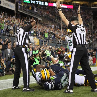 SEATTLE, WA - SEPTEMBER 24: Wide receiver Golden Tate #81 of the Seattle Seahawks makes a catch in the end zone to defeat the Green Bay Packers on a controversial call by the officials at CenturyLink Field on September 24, 2012 in Seattle, Washington. (Photo by Otto Greule Jr/Getty Images)