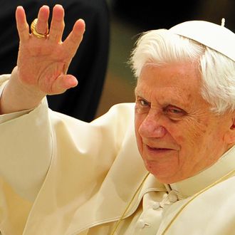 Pope Benedict XVI waves as he arrives for his weekly general audience on February 8, 2012 at Paul VI hall at the Vatican.