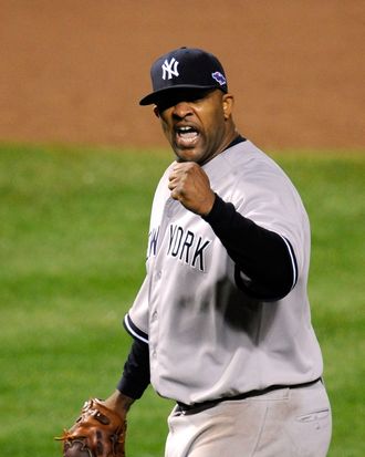 CC Sabathia #52 of the New York Yankees reacts after Mark Reynolds #12 of the Baltimore Orioles grounded out for the final out in the bottom of the eighth inning during Game One of the American League Division Series at Oriole Park at Camden Yards on October 7, 2012 in Baltimore, Maryland.