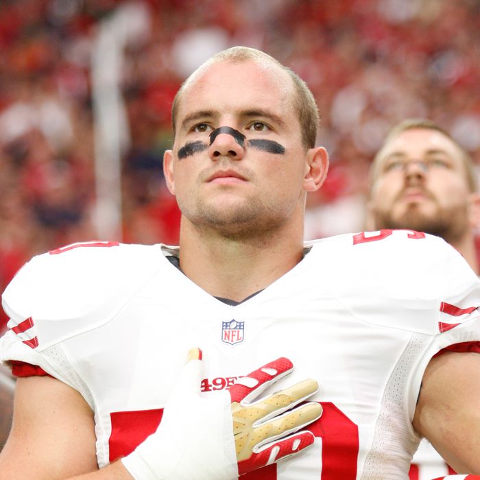 GLENDALE, AZ - SEPTEMBER 14: Chris Borland #50 of the San Francisco 49ers stands for the anthem prior to the game against the Arizona Cardinals at the University of Phoenix Stadium on September 21, 2014 in Glendale, Arizona. The Cardinals defeated the 49ers 23-14. (Photo by Michael Zagaris/San Francisco 49ers/Getty Images) *** Local Caption *** Chris Borland