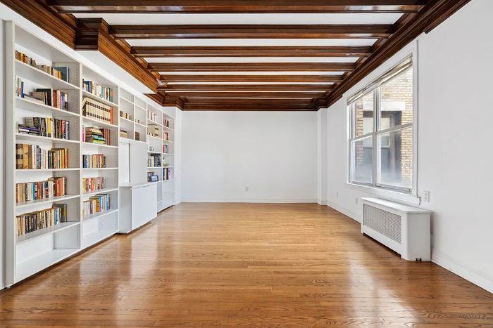A listing photo showing an empty living area in a Morningside Heights one bedroom apartment