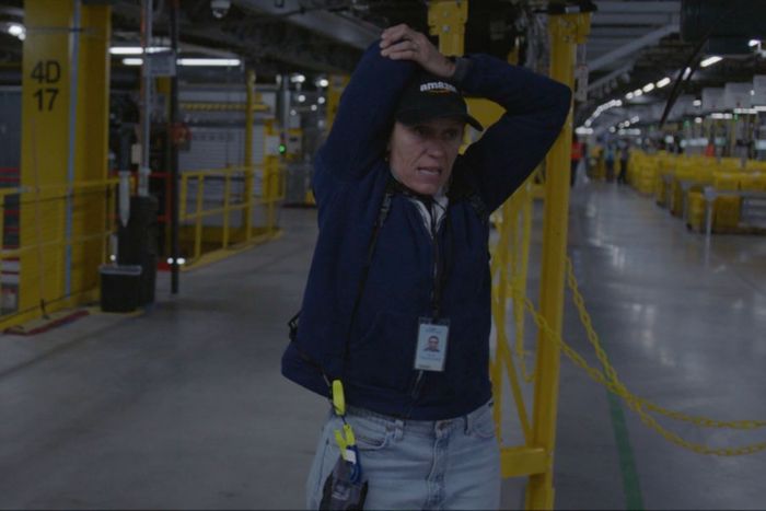 Linda May and Fern stretch before their warehouse shift.